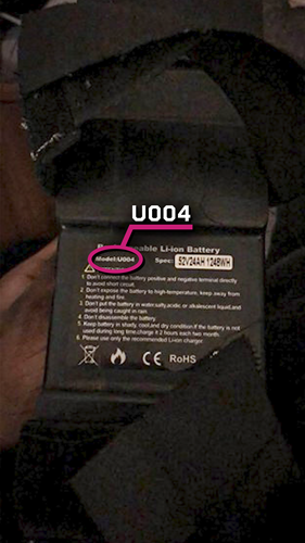 Shows the battery model number on a sticker that reads 'U004'
